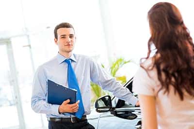 sales manager at a showroom car is worth to the buyer